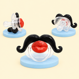 Mini Mister pacifier, three angles